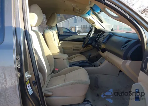 2009 Toyota Tacoma Base V6 из США, поврежденный, VIN 3TMLU42N49M026726